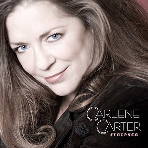 Carlene Carter album cover, portrait of a smiling woman with long hair.