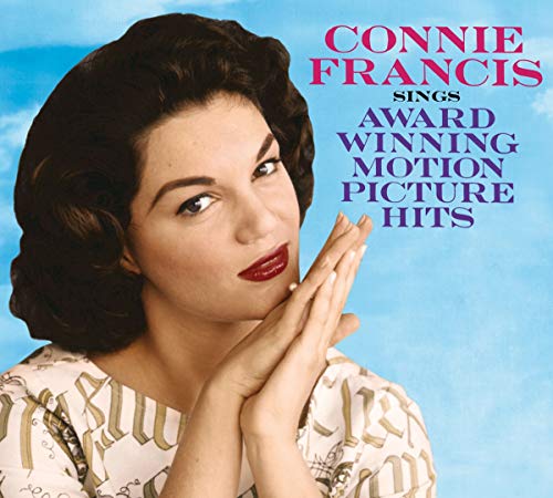 "Album cover featuring Connie Francis with hands clasped, against a blue sky background."