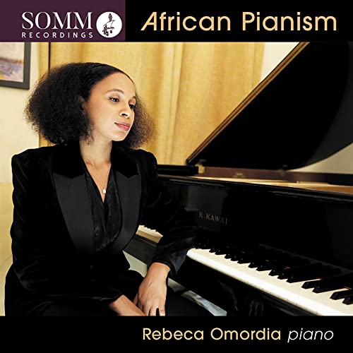 CD cover featuring Rebecca Omordia seated at a grand piano.