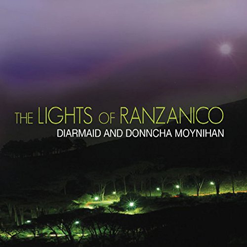 "CD cover with a dark landscape and glowing green lights under a purple sky."