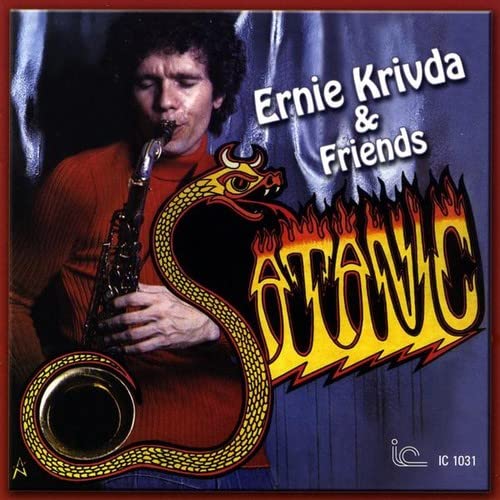 CD cover: man with saxophone, snake, and fiery "Satanic" text.