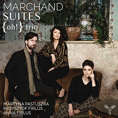 CD cover featuring three people seated on a patterned sofa.