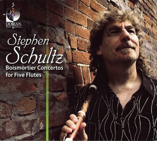 CD cover featuring composer Stephen Schultz with a wooden flute, brick background.