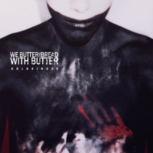 "Album cover featuring a person in a black turtleneck with red handprint on chest."