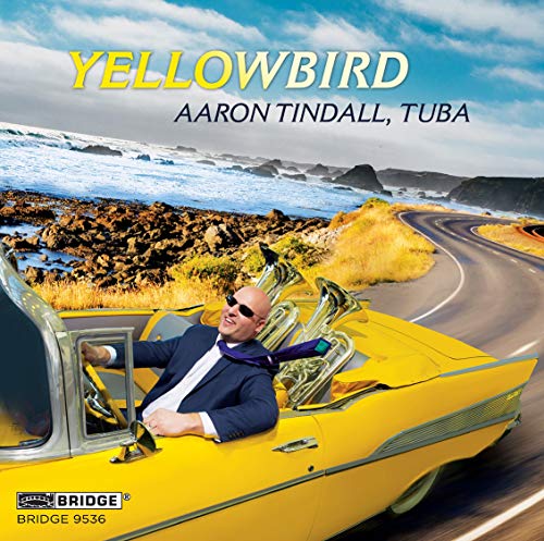 CD cover featuring a man with tubas in a yellow convertible.