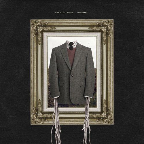 Gray suit jacket in ornate gold frame with torn threads hanging below, on black background.