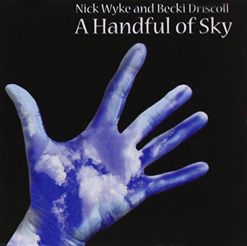 "Album cover with a hand holding clouds against a black background."