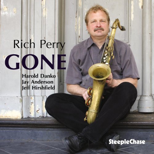 Rich Perry sitting on a step holding a saxophone, with album title and artist text.
