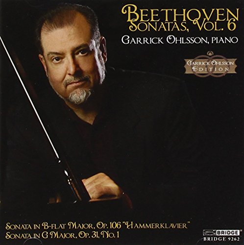 Man in suit holding piano stick, Beethoven Sonatas album cover.