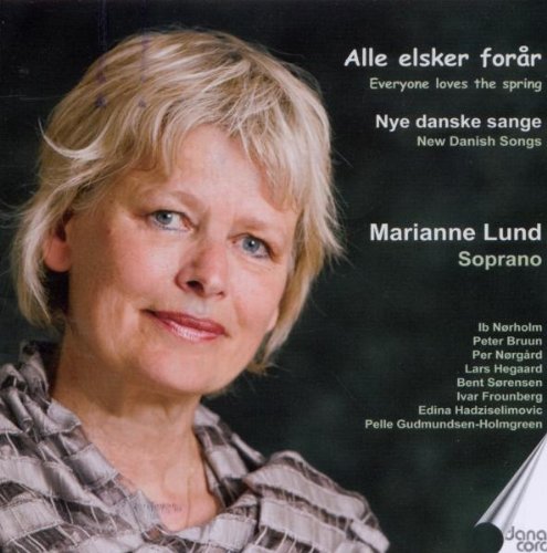 CD cover featuring a blonde woman with a dark background and white text.
