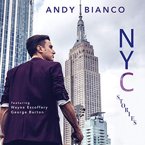 CD cover featuring a man in a suit with the Empire State Building.