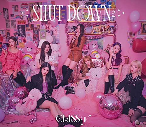 K-pop group CLASS:y poses in a pink room with teddy bears and balloons.
