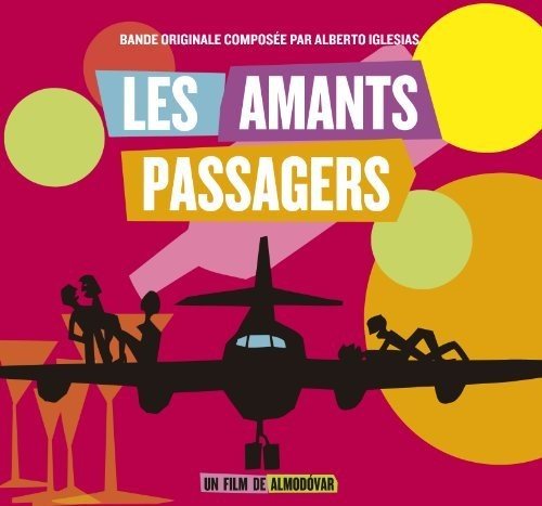 "Album cover with airplane graphic, colorful circles, and text on a red background."
