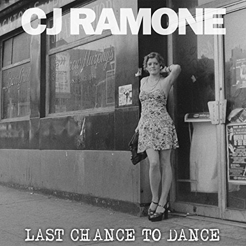 CD cover: black and white photo of a woman leaning against a storefront.