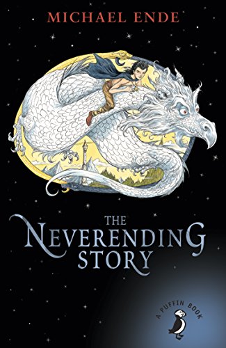 "The Neverending Story" book cover featuring a boy riding a white dragon against a starry night.