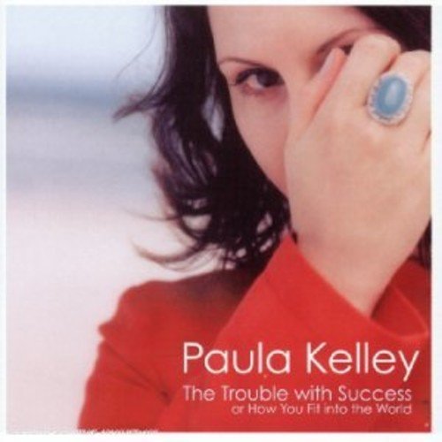 CD cover featuring Paula Kelley, close-up portrait with red accents.