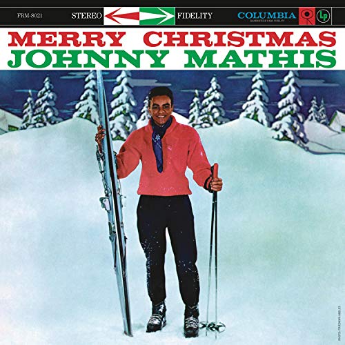 Johnny Mathis album cover, "Merry Christmas," depicting him skiing in a winter scene.