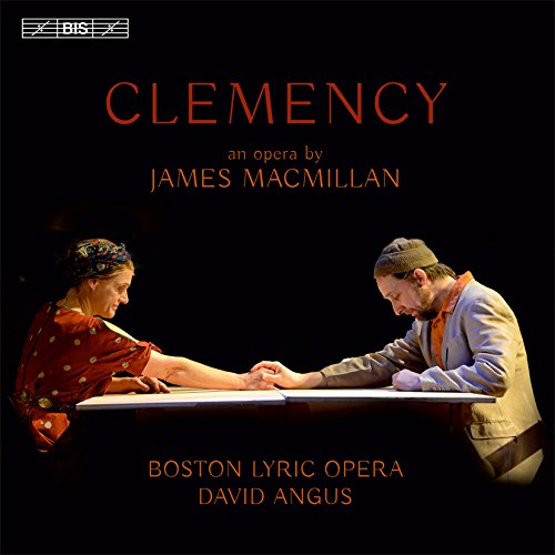 "CD cover with two people holding hands across a table, against a black background."