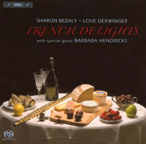 "CD cover with a table set with food, champagne, and a flute."