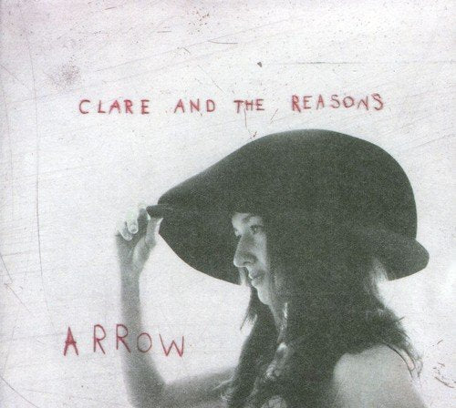 "Album cover with sepia-toned woman wearing a hat, titled 'Clare and the Reasons - Arrow'."