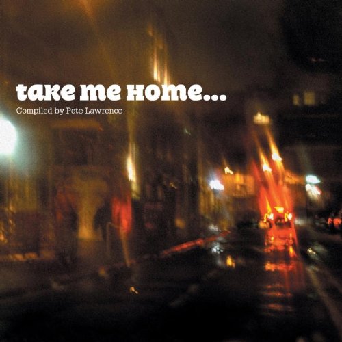 "Blurry nighttime city street scene with 'take me home...' text in white font."