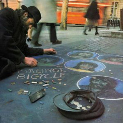 Man drawing on sidewalk with chalk, surrounded by coins, hat, and "Orange Bicycle" text.