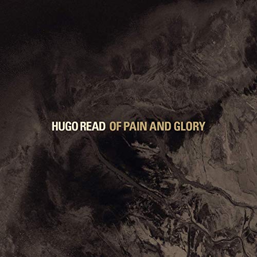 The image shows a CD cover with a dark, abstract background and the title "HUGO READ OF PAIN AND GLORY" in white and yellow text. Alt text: Dark abstract CD cover with "HUGO READ OF PAIN AND GLORY" in white and yellow.