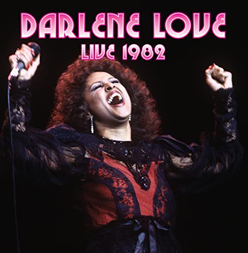 Darlene Love singing into a microphone on a stage, 1982 album cover.