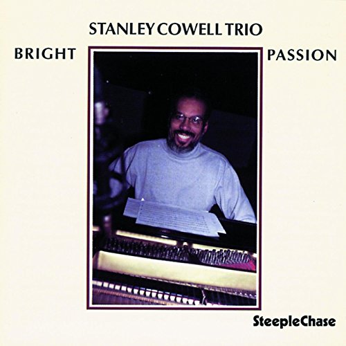 Stanley Cowell at a piano, album cover for "Bright Passion" CD.