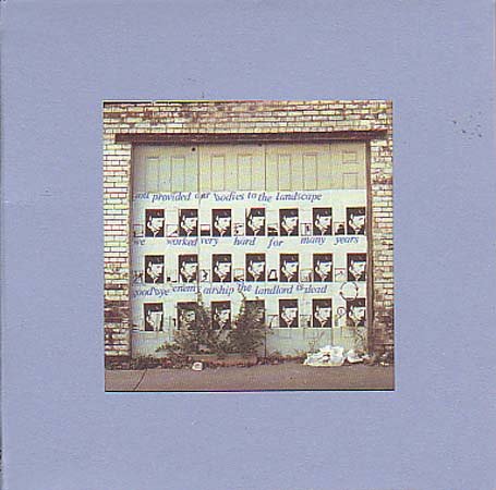 CD cover: brick wall with repeated portrait collage and text.