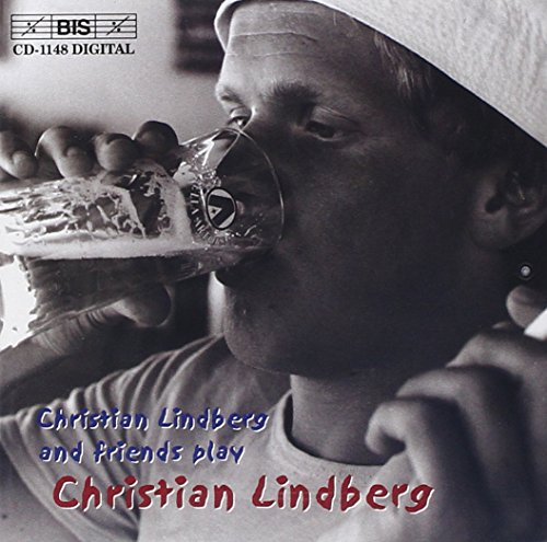 "Black and white album cover with a man drinking from a glass."