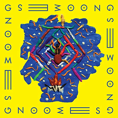 CD cover: colorful clay sculpture of a bug within geometric shapes.