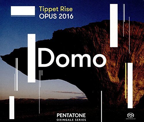 "Domo" CD cover featuring a rocky landscape with white and yellow geometric shapes.