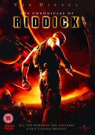 Riddick DVD cover: Vin Diesel in a dark, fiery sci-fi landscape.