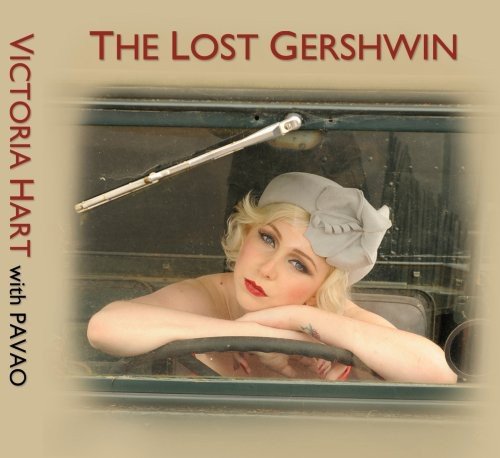 "Album cover with a vintage image of a woman in a car."