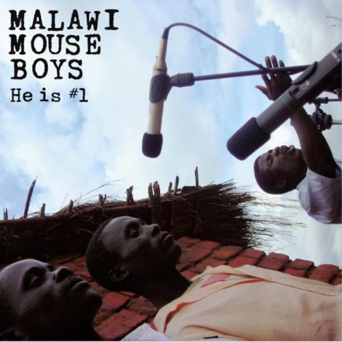 "Album cover with three boys looking up at a microphone on a cloudy day."