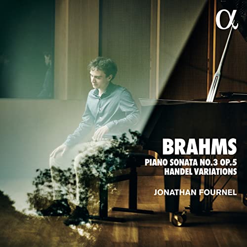 Pianist Jonathan Fournel at a grand piano, album cover for Brahms and Handel.