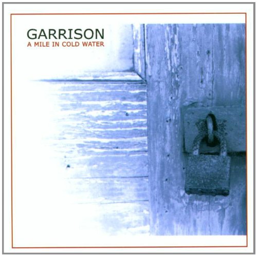 CD cover: weathered wood with a padlock, blue and white tones.