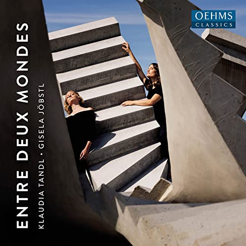 CD cover: two figures on concrete stairs, minimalist design, blue logo.