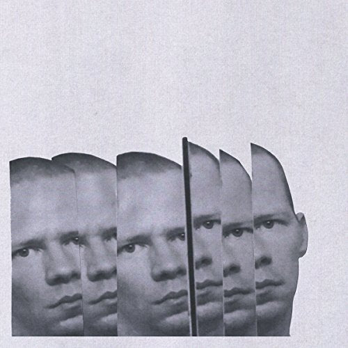 Black and white fragmented portrait of a man’s face.