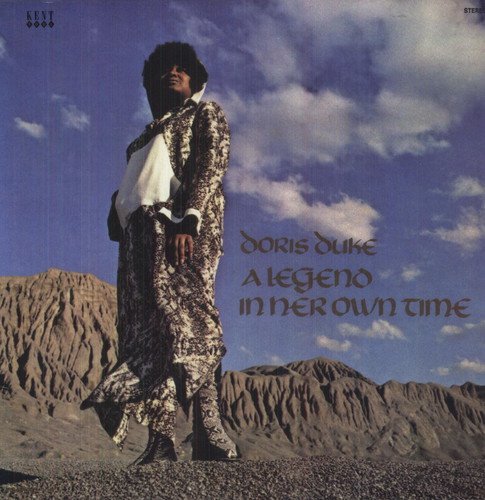 Doris Duke album cover: a woman in patterned clothing stands in a landscape.
