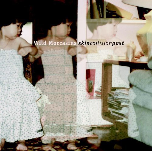 Album cover: two young girls in white dresses standing on a patterned rug.