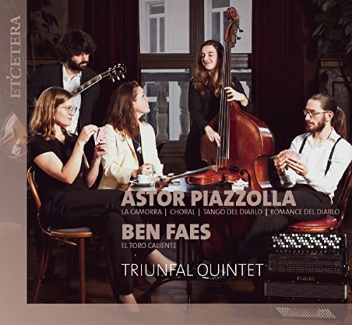 Musical quintet posing with instruments, cards, and teacups in a room.