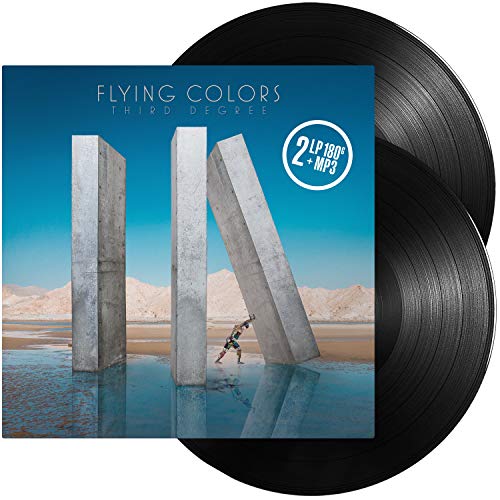 "Vinyl record album cover with desert landscape and concrete pillars, two black vinyl records visible."