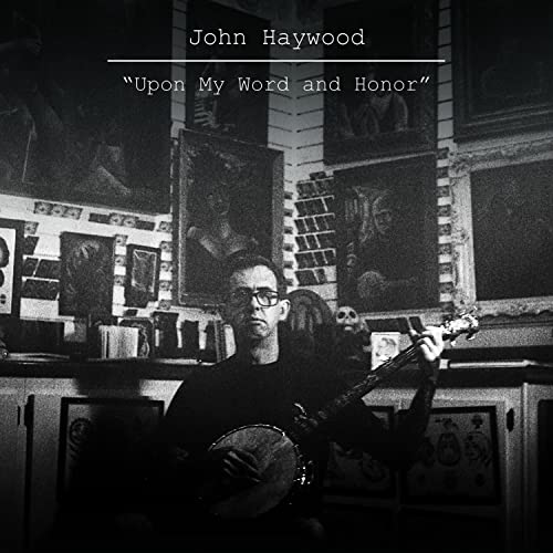 Black and white CD cover featuring a man playing a banjo in a room.