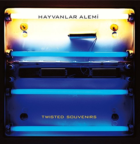 Album cover with glowing blue and white lights, text "Hayvanlar Alemi".