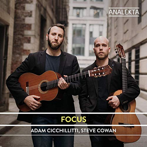"Album cover featuring two men holding acoustic guitars, with cityscape in the background."