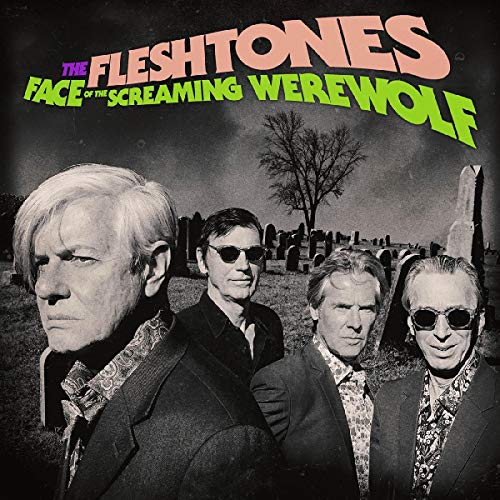 Album cover: four men in suits before a graveyard and moon.