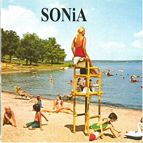 CD cover: Lifeguard in tower overlooking a crowded beach scene.