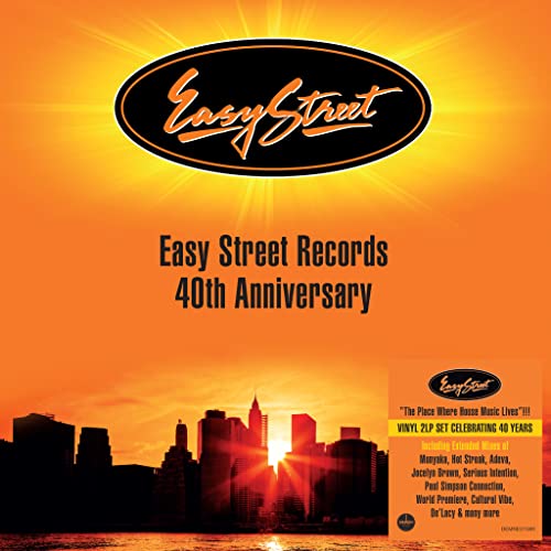 Easy Street Records 40th anniversary vinyl cover with a sunset city skyline silhouette.